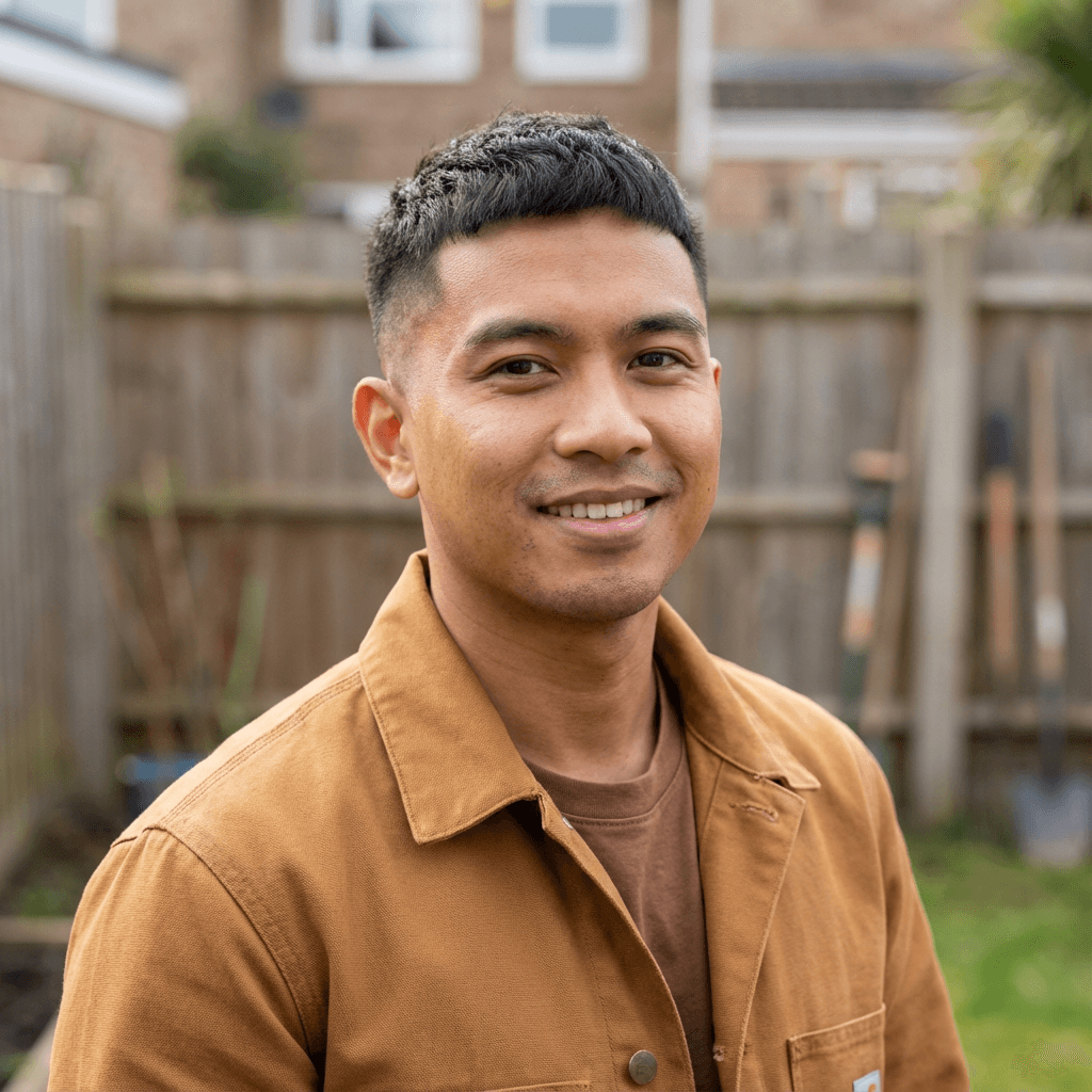 Male dentist in his mid 40s, Asian, professional appearance in a modern dental office